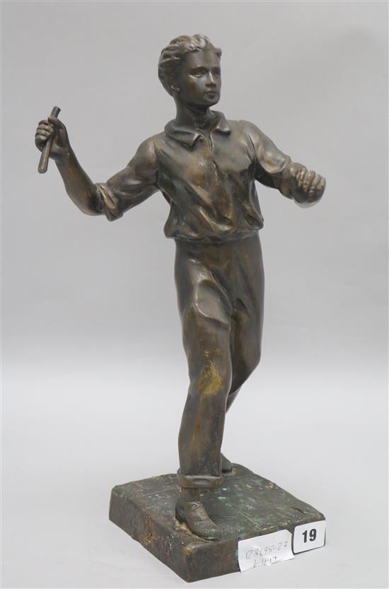 A bronze figure of a man